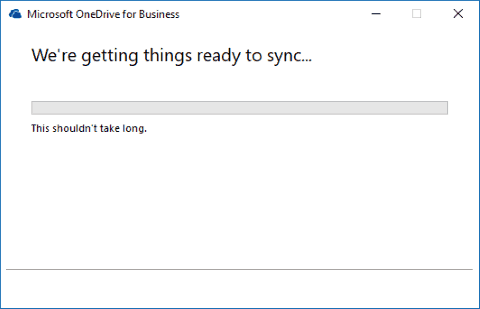 Captura de pantalla que muestra el cliente de sincronización de OneDrive para la empresa "preparándose" pantalla